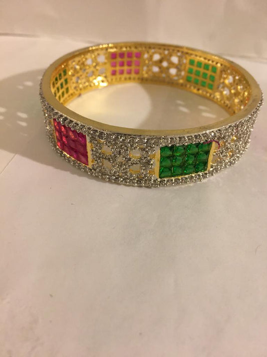 Gold pltd with coloured stones and dimond